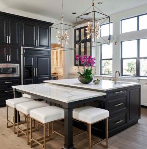 Painted kitchen cabinets in Sherwin Williams SW 7005 Pure White, black island in Benjamin Moore BM 2133-10 Onyx, Paper Moon Painting, cabinet painters, black wall
