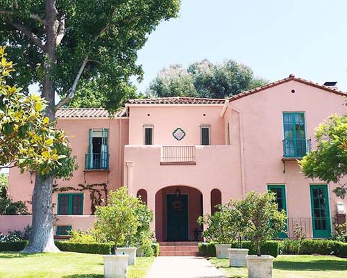 pink exterior stucco house, better exterior color