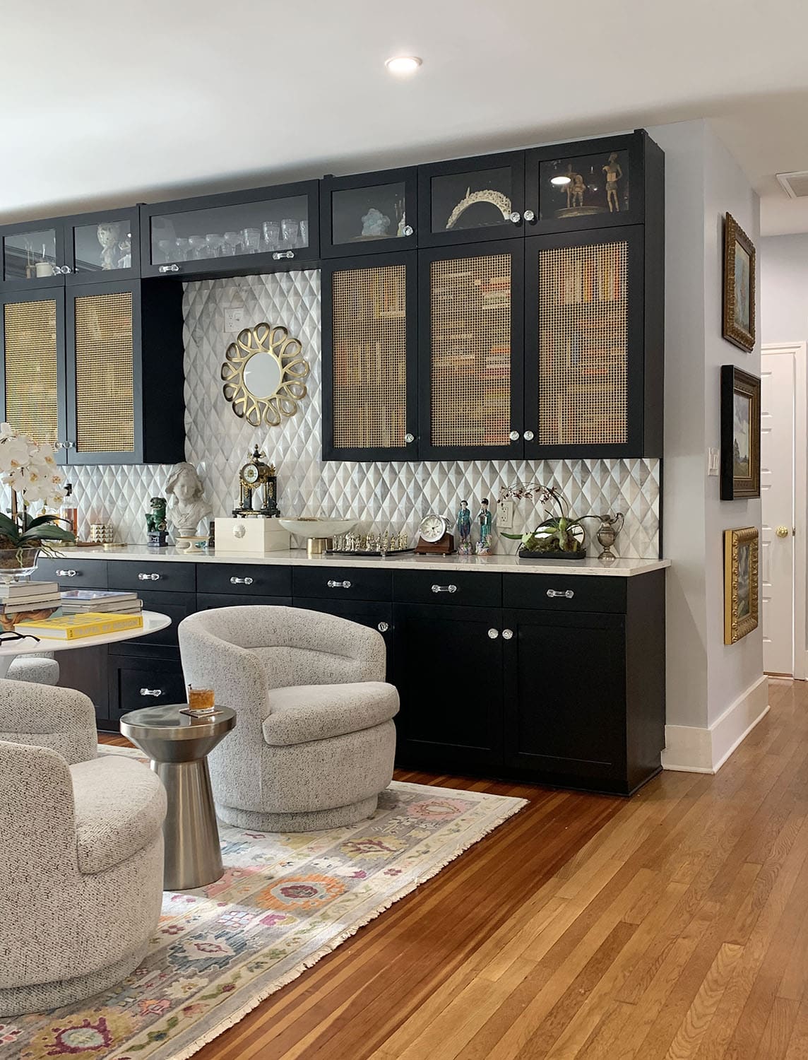 black-painted-cabinets-with-brass-mesh-inserts-paper-moon-painting-san-antonio