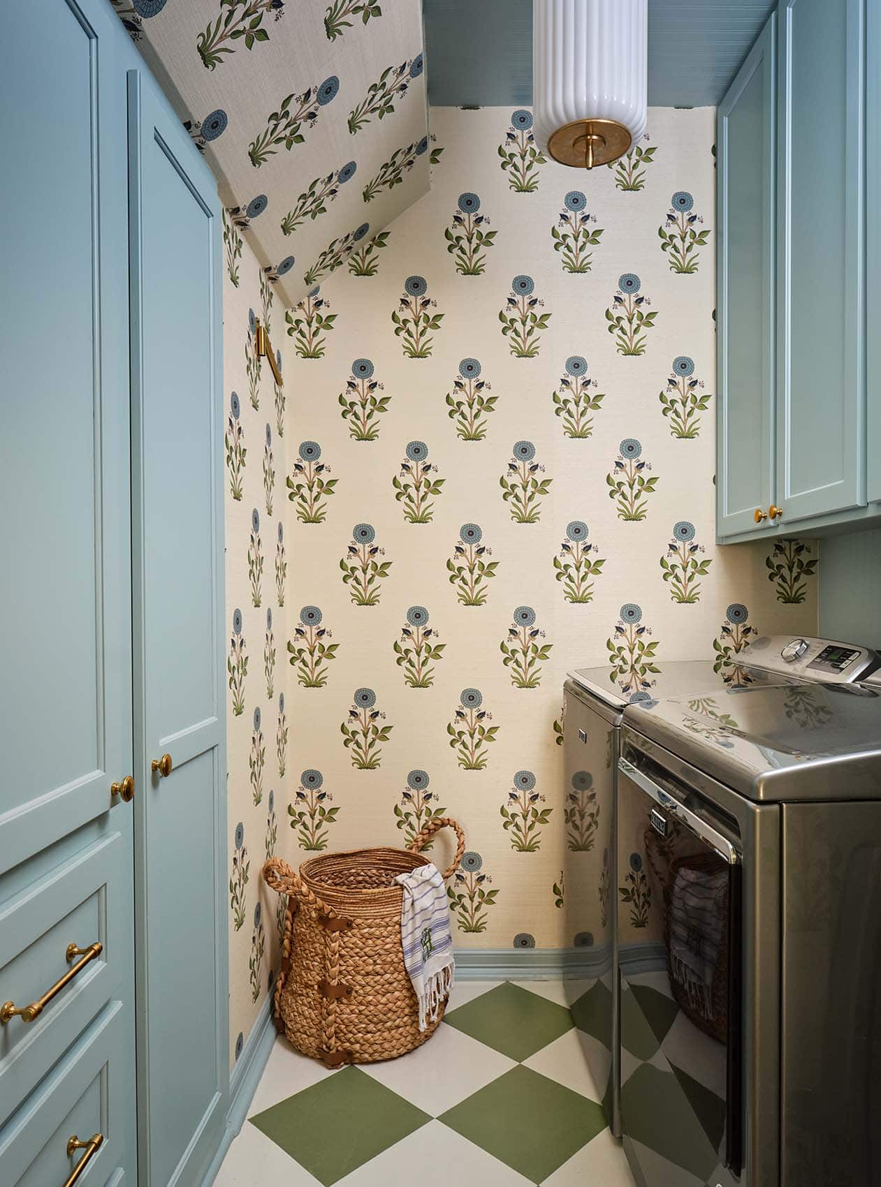 wallpapered-laundry-room-with-blue-cabinets-san-antonio-tx-installer