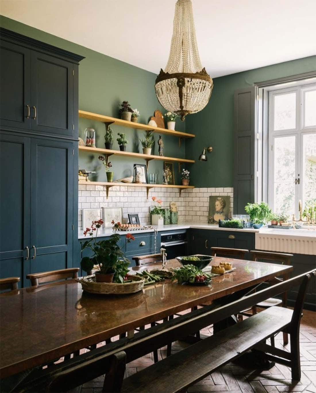 traditional-european-kitchen-with-deep-green-cabinets-and-green-walls