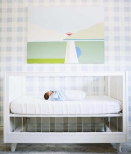 baby-boy-nursery-with-blue-gingham-wallpaper-and-lucite-crib-by-vogeinteriors