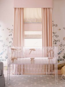 modern-pink-chinoiserie-wallpaper-mural-in-nursery-with-lucite-crib-by-vogeinteriors