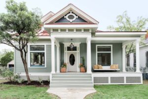 front-exterior-of-historic-home-renovation-in-farrow-and-ball-card-room-green-by-paper-moon-painting-for-kim-wolfe-hgtv